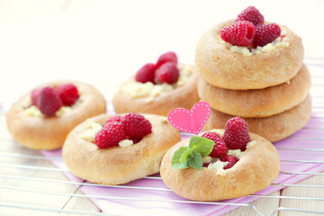 buns with raspberries