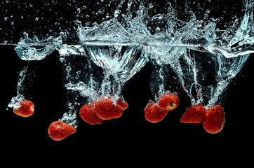 Strawberry Fruit Splash on water © Nmedia