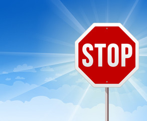 Stop Roadsign on Blue Sky Background