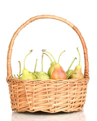 ripe pears in basket isolated on white.