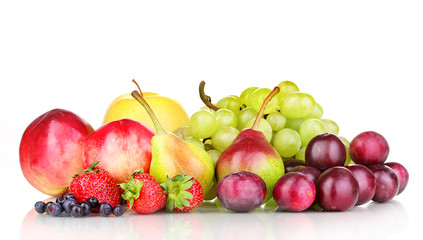 Mix of ripe sweet fruits and berries isolated on white