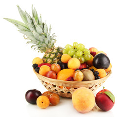 Naklejka na ściany i meble Still life of fruit in basket isolated on white