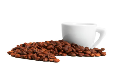 handful of coffee beans and cup