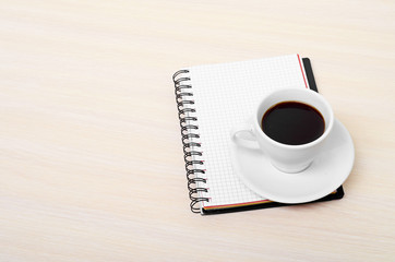 Coffee cup with note book