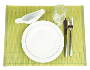 Table setting on a bamboo mat