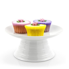Cupcake selection on white china stand