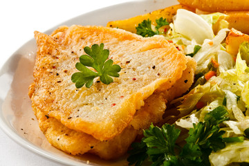 Fish dish - fried fish fillets and vegetables