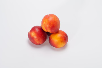 Fresh Peaches isolated on white