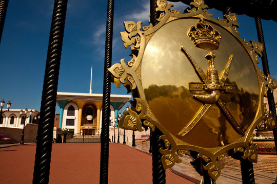 Sultan's palace in Muscat, Oman - with golden coat of arms