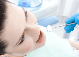 Patient is ready for curing her teeth