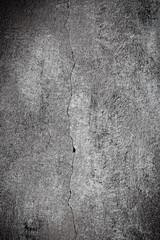 Cracked plaster concrete wall - black and white