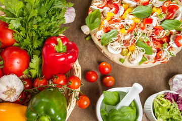 Pizza and fresh ingredients