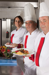 group of young beautiful professional chefs 
