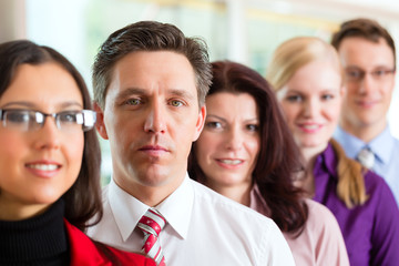 Fototapeta premium Business - Team oder Geschäftsleute in einem Büro