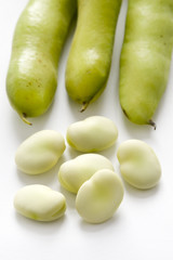 broad beans on white background