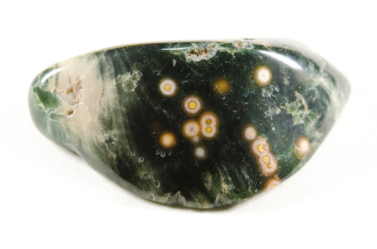 small piece of ocean jasper dark green with yellow eyes