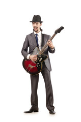 Naklejka premium Young guitar player isolated on white