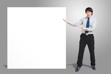 Asian business man showing blank signboard