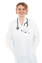 Fototapeta premium Beautiful female physician in white uniform