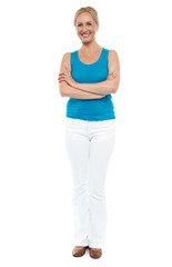 Fototapeta premium Full length portrait of casual cheerful woman