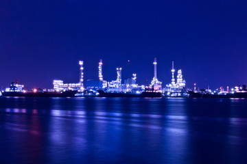 Fototapeta na wymiar Oil refinery plant along river in Bangkok
