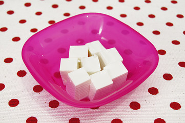 Fresh white cottage cheese on homey background