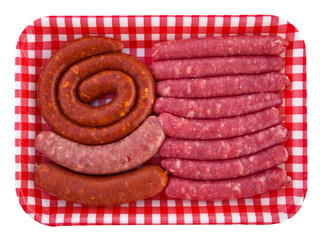 Various sausages on the checkered tray