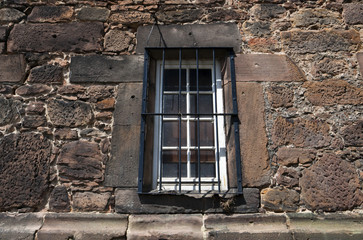 Fototapeta na wymiar old window with bars