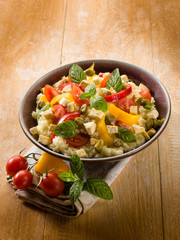 vegetarian couscous with tofu capsicum tomatoes mint and capers