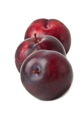 Red plum fruit isolated on white background 