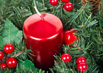 Christmas candle and pine branch