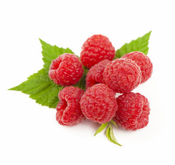 Ripe raspberry with green leaf on white background