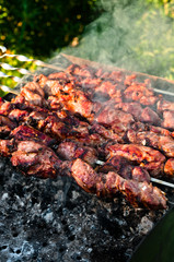 Meat pieces cooking on brazier