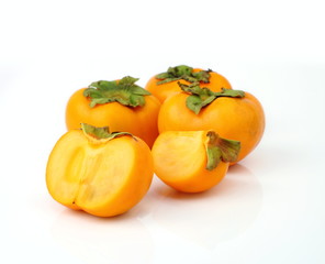 Persimmon tropical fruit slice on half