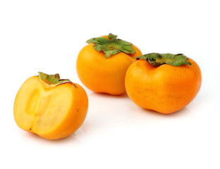 Persimmon tropical fruit slice on half