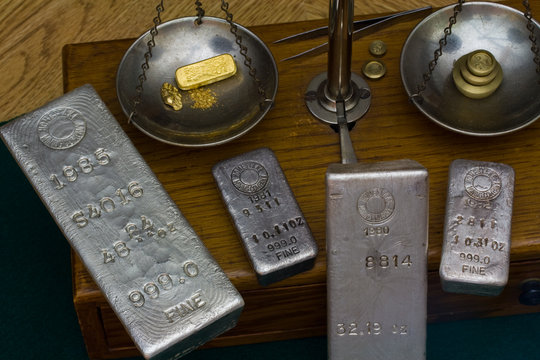 Silver Bullion Bars - Gold Bar, Nugget and Dust on Scale