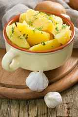 Boiled potatoes with dill and butter