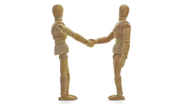 Wooden Mannequins sch&uuml;tteln sich die H&auml;nde