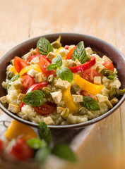 vegetarian couscous with tofu capsicum tomatoes mint and capers