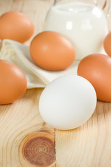 Jug with milk and eggs