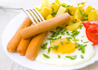 breakfast. potato, egg and sausage