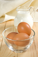 Jug with milk and eggs