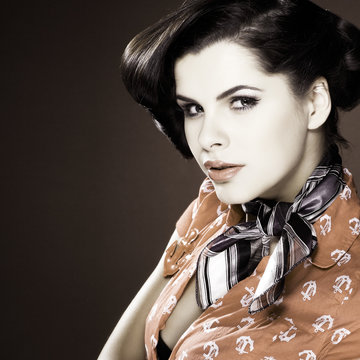 Fototapeta A photo of beautiful brunette is in style of pinup, glamur