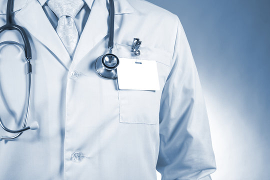 Stethoscope On White Doctor Coat Stock Photo Picture And Royalty Free  Image Image 9533610