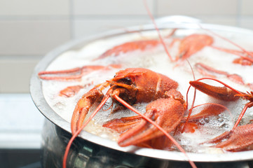 crawfish boiling in a large pot