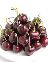 Red Cherries on White Dish
