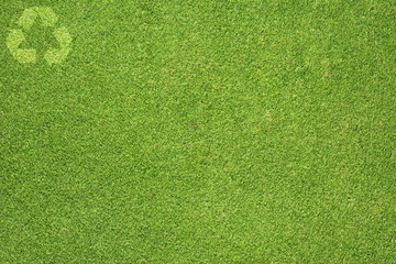 Recycle on Green grass,  texture background