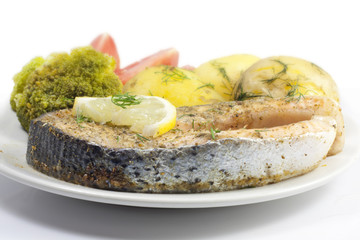 Roasted salmon with young potatoes and broccoli