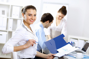 Young business people working together