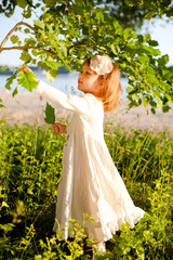 Beauty Little Girl with in the garden